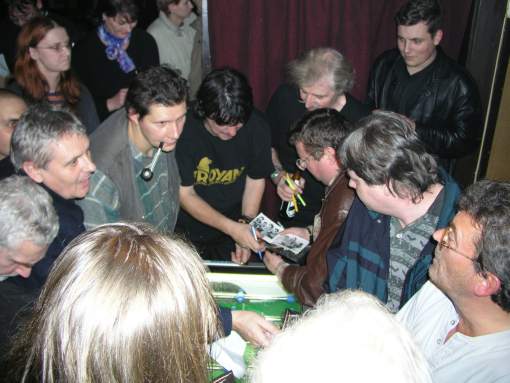 signing and talking after concert